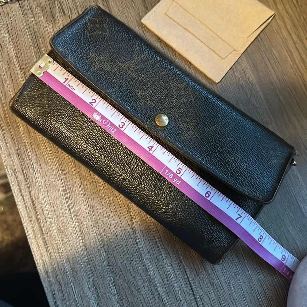 Authentic Louis Vuitton Wallet; used as a crossbody reposhing from @Jebwa